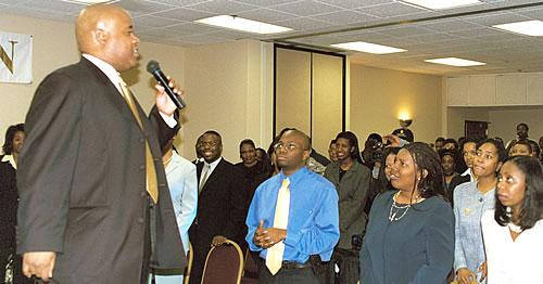 Delxino speaking to audience, Los Angeles, California Black Business Seminar