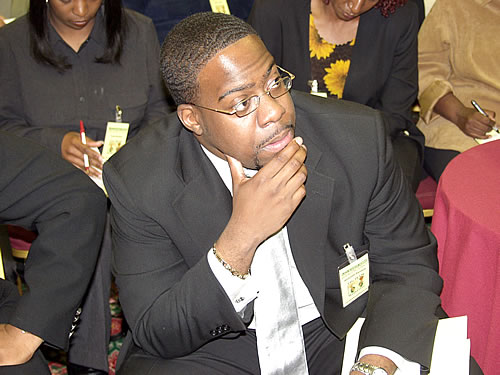 Abdullah listening, Los Angeles, California Black Business Seminar