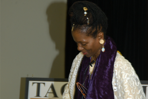 Queen Afua speaking on stage, Atlanta, Georgia Black Business Seminar