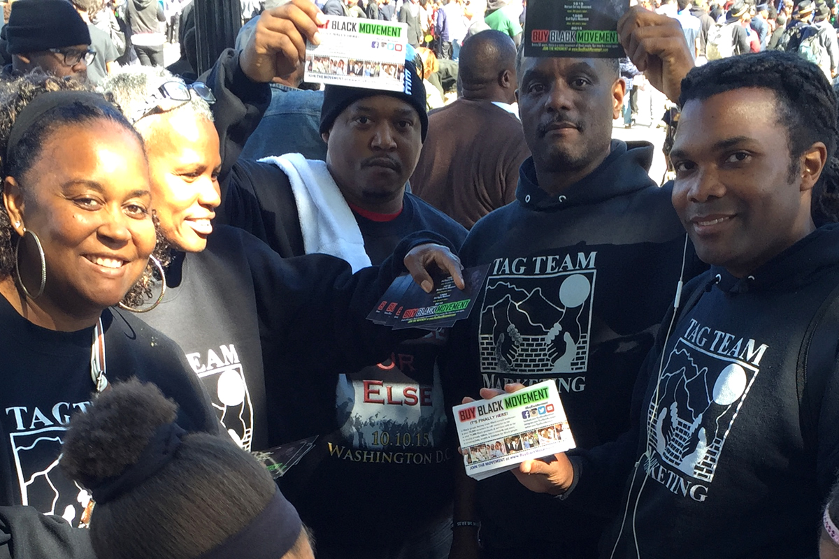 TAG TEAM Marketers preparing to hand out Buy Black Movement flyers, Justice Or Else March in Washington, DC, 2015